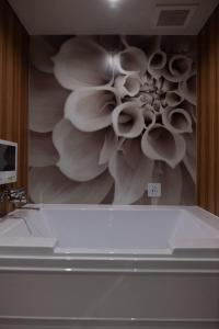 Phòng tắm tại ホテルCOO玖　男塾ホテルグループ