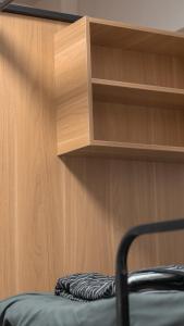Postel nebo postele na pokoji v ubytování Hi Tray 屋裡有個脆背包客棧