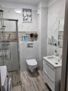 Phòng tắm tại Apartament Sami Swoi