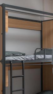 Postel nebo postele na pokoji v ubytování Hi Tray 屋裡有個脆背包客棧