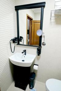 Koupelna v ubytování Pensiunea Casa Doamnei Voronet + 35 fotografií