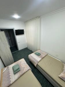 Cama ou camas em um quarto em ZARA Guest House
