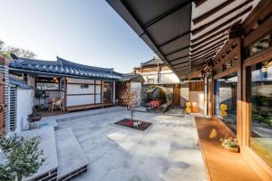 an external view of a house with a patio at And spring in Jeonju