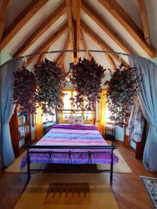A bed or beds in a room at The Place by the Sun