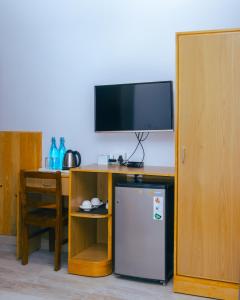 A cozinha ou kitchenette de Roamers Inn