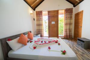Postel nebo postele na pokoji v ubytování Sabba Beach Suite , Fodhdhoo - Maldives
