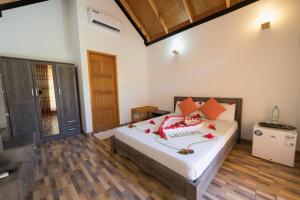 Postel nebo postele na pokoji v ubytování Sabba Beach Suite , Fodhdhoo - Maldives