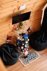 an overhead view of a living room with a christmas tree at Via Kazbegi in Stepantsminda