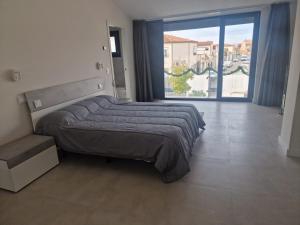 Ένα ή περισσότερα κρεβάτια σε δωμάτιο στο Casa Juliana +10 φωτογραφίες