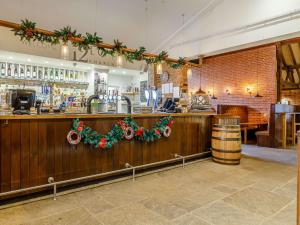 a bar with christmas wreaths on the counter at 3 Bed in Dunwich 85183 in Westleton