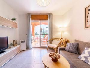 a living room with a couch and a table at CABO DE LAS ÁGATAS in El Cabo de Gata