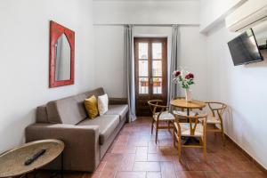 Posezení v ubytování La Jⲟya de los Patios - Apartamentos Turísticos