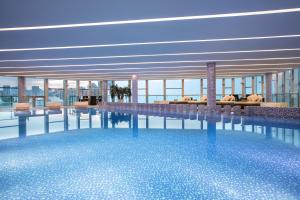 Bazén v ubytování InterContinental Beijing Beichen by IHG l Walking Distance to Bird's Nest & Water Cube & Metro Station l Interconnected with China National Convention Center l Award-winning Club Lounge with Mixologist l Direct Metro Line to Wangfujing nebo v jeho okolí