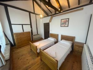 Postel nebo postele na pokoji v ubytování Sveti Georgi unique guest house