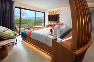 Кровать или кровати в номере W Costa Rica Resort – Playa Conchal