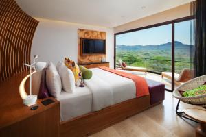 Телевизор и/или развлекательный центр в W Costa Rica Resort – Playa Conchal