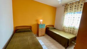 Ένα ή περισσότερα κρεβάτια σε δωμάτιο στο MEDDAYS VILLA JADE +13 φωτογραφίες