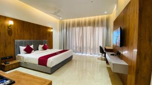 TV a/nebo společenská místnost v ubytování Gaurison Hotel and Resorts