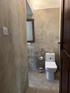 Koupelna v ubytování Mlango Paje House II