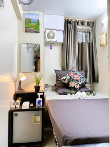 Giường trong phòng chung tại International Inn