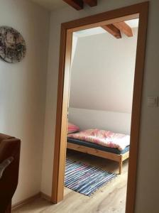 Posteľ alebo postele v izbe v ubytovaní Mezonetové apartmány Lea a Laura Donovaly