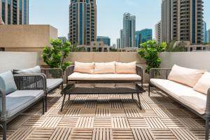 Prime Retreats - 29 Emaar Boulevard Downtown Dubai tesisinde bir oturma alanı