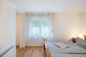 Postel nebo postele na pokoji v ubytování Carlchens Casa