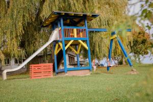 a playground with a slide in a park at Landhotel Schellenberg in Überlingen