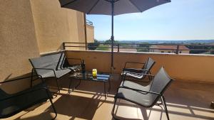 Balkon lub taras w obiekcie Apartment Bluemare with shared pool