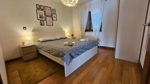 Łóżko lub łóżka w pokoju w obiekcie Apartment Bluemare with shared pool