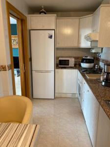 Kuchyň nebo kuchyňský kout v ubytování Charm Apartment 90m2