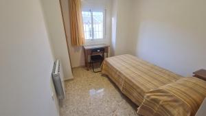 Postel nebo postele na pokoji v ubytování ALBERGUE LA TIÑOSA