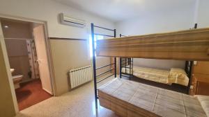 Postel nebo postele na pokoji v ubytování ALBERGUE LA TIÑOSA