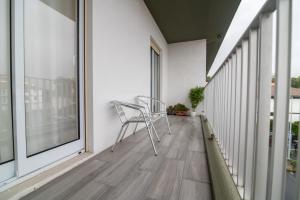 Balkón nebo terasa v ubytování Green Island City Apartment