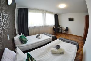 Postel nebo postele na pokoji v ubytování Noclegi Bytom - OPAL
