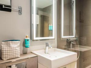 חדר רחצה ב-Novotel Amsterdam City