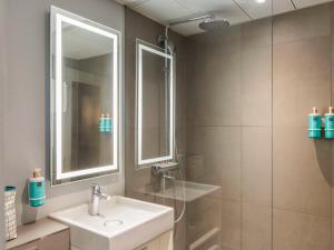 חדר רחצה ב-Novotel Amsterdam City