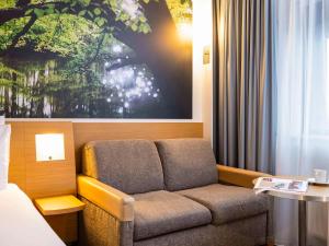 אזור ישיבה ב-Novotel Amsterdam City