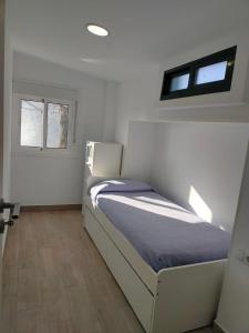 Ένα ή περισσότερα κρεβάτια σε δωμάτιο στο Casa Josiño