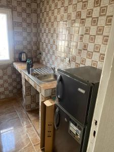 Virtuvė arba virtuvėlė apgyvendinimo įstaigoje La Belle Planque
