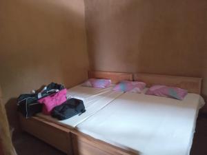 Postel nebo postele na pokoji v ubytování Sinharaja Sky Residence + 27 fotografií