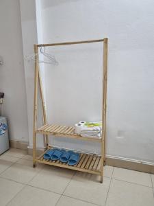 a towel rack with towels on it in a room at Bluebell Hotel in Hanoi