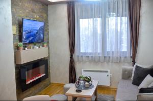 Μια τηλεόραση ή/και κέντρο ψυχαγωγίας στο Golden Diamond - Zlatibor - Titova vila