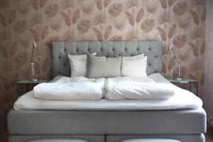 Voodi või voodid majutusasutuse Hotell Vaxblekaregården toas
