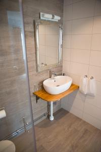 Vannituba majutusasutuses Hotell Vaxblekaregården