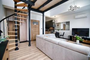 Χώρος καθιστικού στο Laguna Beskidów Resort - Apartament C50 +34 φωτογραφίες