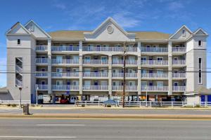 a large white building on the side of a street at Mariners Watch 304 - Luxury Bayview Condo in Ocean City