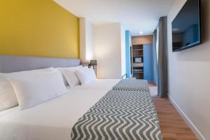 Posteľ alebo postele v izbe v ubytovaní Barceló Margaritas