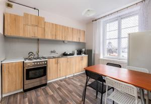 מטבח או מטבחון ב-Targ Rybny Standard Apartment