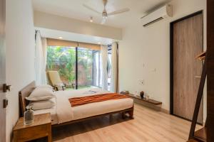 Voodi või voodid majutusasutuse 2 BHK Property with Garden and Pool toas